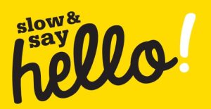 Slow and Say Hello Logo